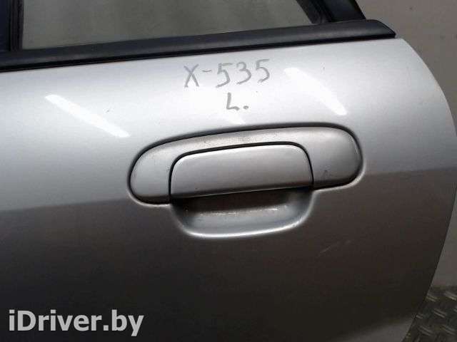 ручка боковой двери наружная зад лев Mazda 323 BJ 2002г.  - Фото 1
