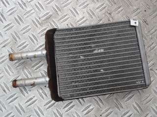 радиатор отопителя Kia Sephia 1 1996г.  - Фото 2
